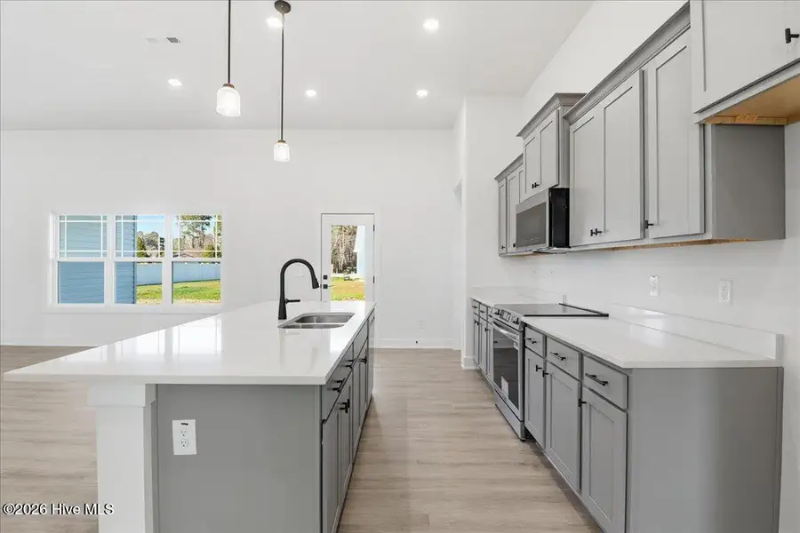 Furnished interior view inside a new home in Wood Creek, Leland (Image 4).