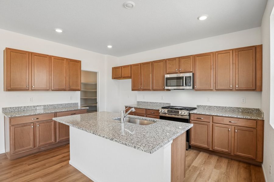 Furnished interior view inside a new home in The Cottages Collection at Ridgeline Vista, Brighton (Image 6).
