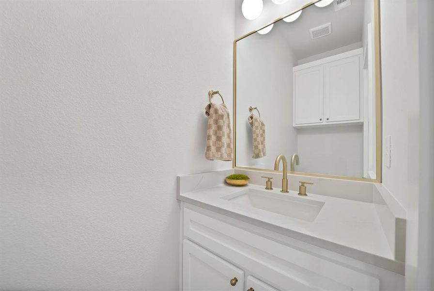 Bathroom featuring vanity Bathroom featuring vanity
