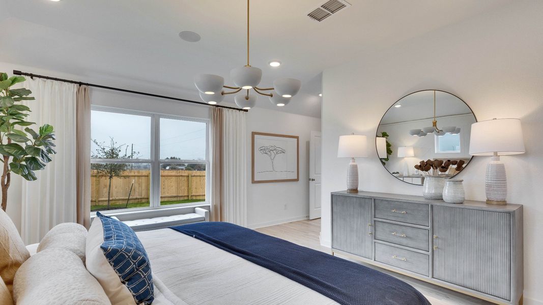 Representative furnished interior of a home built from the Meyerson by DRB Homes in Infinity Square, Kyle (Image 35).