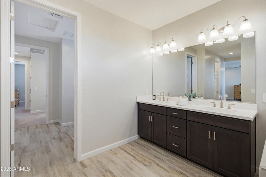 Primary Bathroom to Laundry