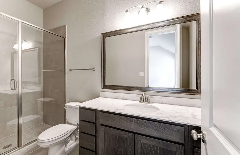 Representative furnished interior of a home built from the 2909 by Ravenna Homes in The Woodlands Hills 65′, Willis (Image 17). Representative furnished interior of a home built from the 2909 by Ravenna Homes in The Woodlands Hills 65′, Willis (Image 17).