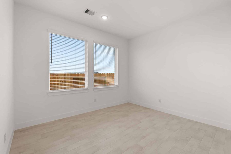 Spacious, unfurnished interior of a new home in Brookewater, Rosenberg (Image 17).