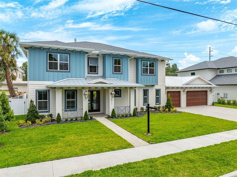 Front exterior of a new home in , Tampa, FL, highlighting curb appeal (Image 28).