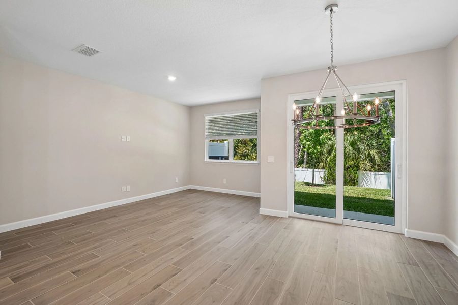 Dining space opens up into the family room