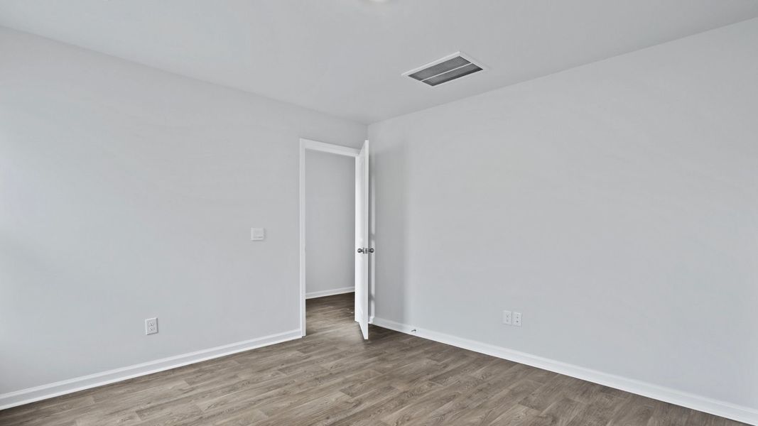 Spacious, unfurnished interior of a new home in Lockwood Landing, Supply (Image 17).