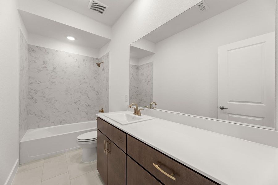 Furnished interior view inside a new home in Garden Collection at Union Park, Little Elm (Image 12).