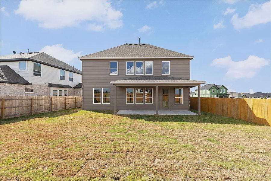 Exterior details and patio area of a home in The Grove at Blackhawk, Pflugerville (Image 4).
