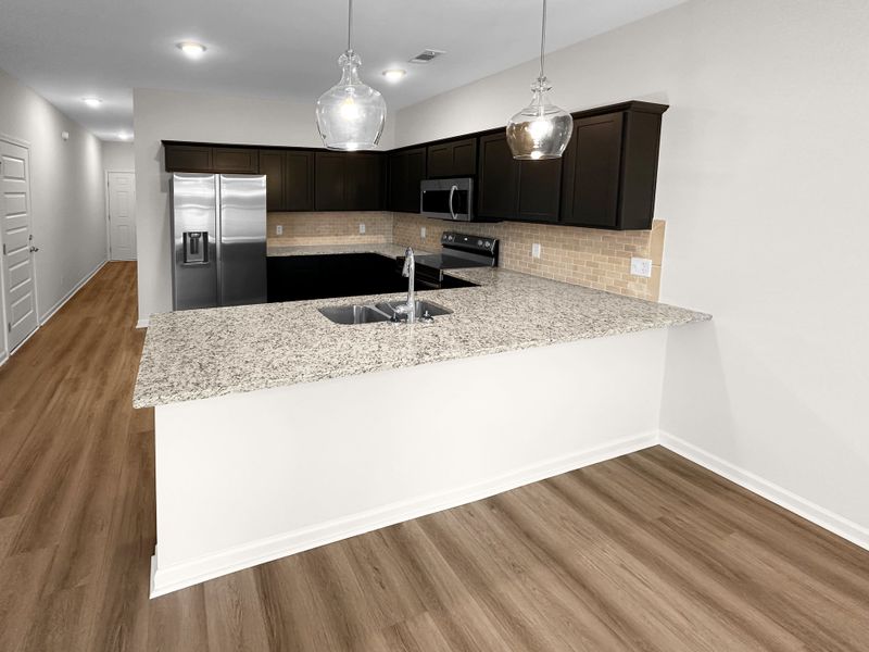 Furnished interior view inside a new home in Grand Reserve, Hinesville (Image 9).