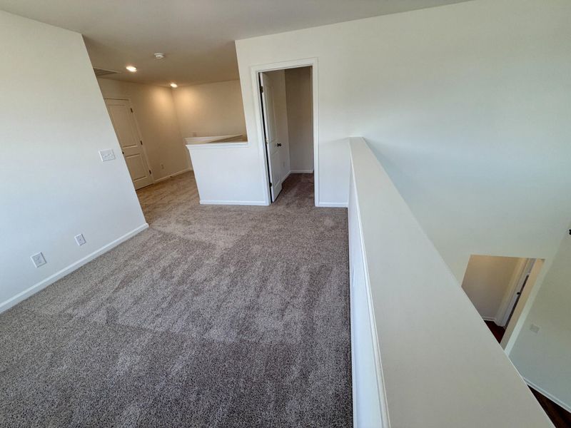 Spacious, unfurnished interior of a new home in Bellevue Townhomes, Greenville (Image 11).