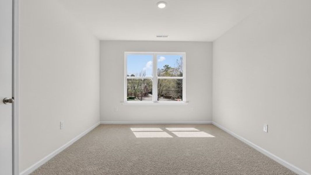 Spacious, unfurnished interior of a new home in English Farm, Archdale (Image 21).