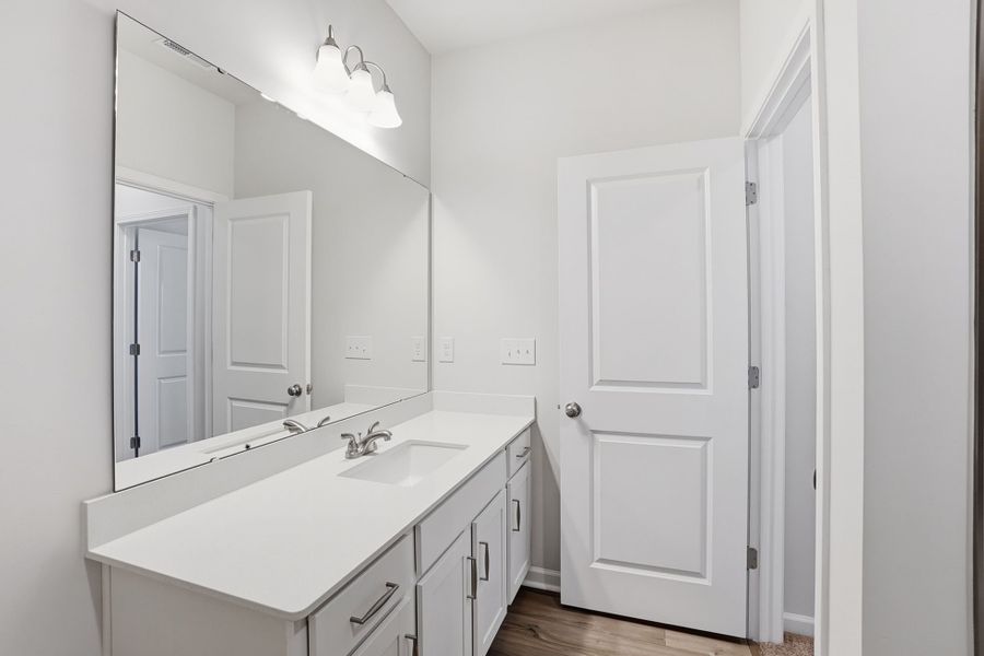 Furnished interior view inside a new home in Sloan Station, Charlotte (Image 9).