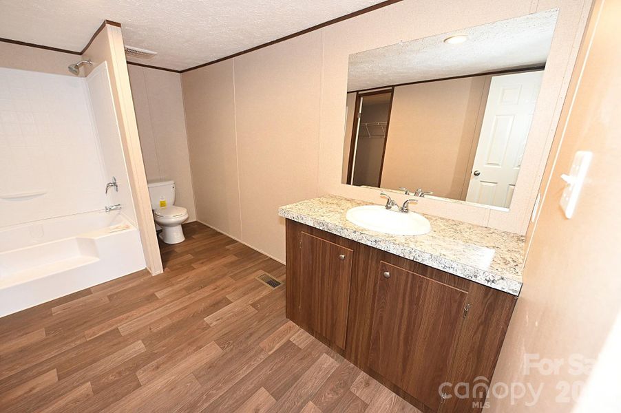 Furnished interior view inside a new home in , Stony Point (Image 12).