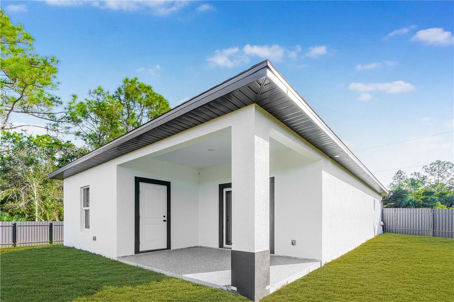 Exterior details and patio area of a home in , Lehigh Acres (Image 22).