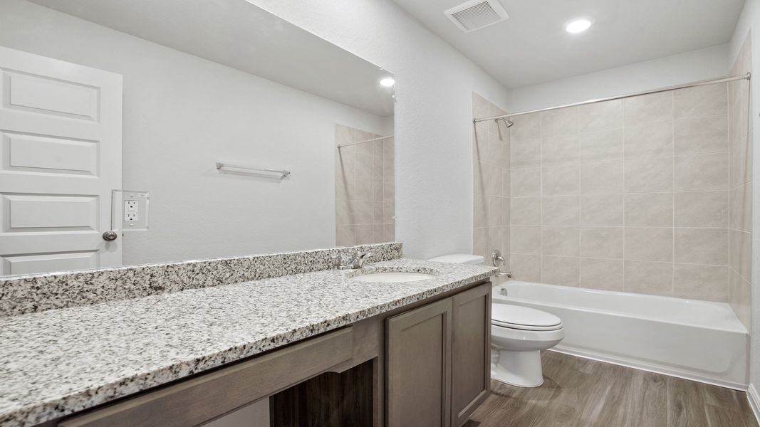 Furnished interior view inside a new home in Hunters Ranch, San Antonio (Image 6).