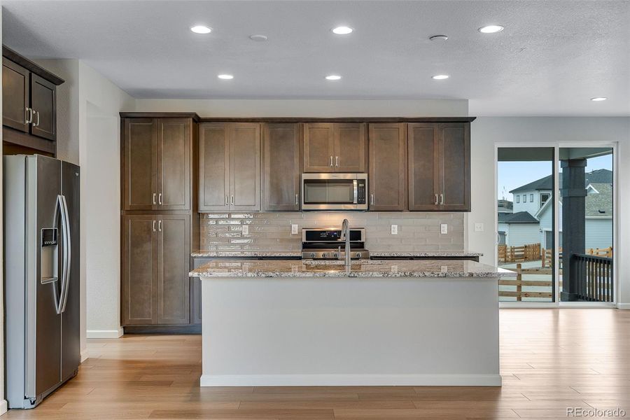 Furnished interior view inside a new home in Crescendo Collection at Reunion, Commerce City (Image 16). Furnished interior view inside a new home in Crescendo Collection at Reunion, Commerce City (Image 16).