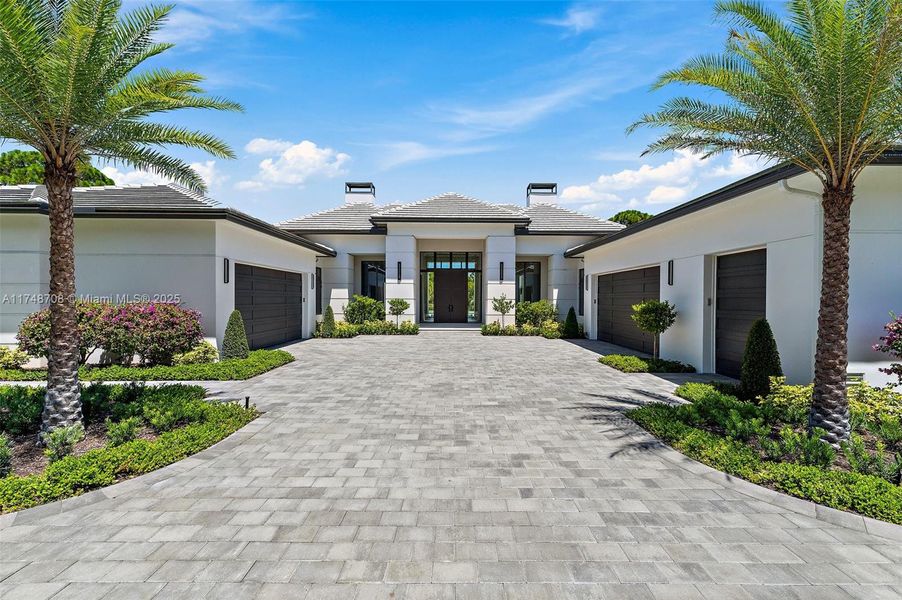 Front exterior of a new home in , Jupiter, FL, highlighting curb appeal (Image 25). Front exterior of a new home in , Jupiter, FL, highlighting curb appeal (Image 25).