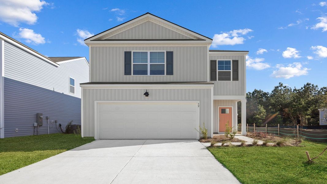 Front exterior of a new home in Rice Hope, Port Wentworth, GA, highlighting curb appeal (Image 1). Front exterior of a new home in Rice Hope, Port Wentworth, GA, highlighting curb appeal (Image 1).
