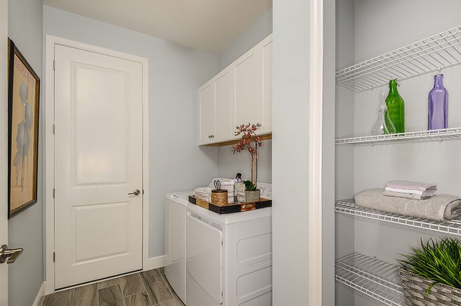 Representative furnished interior of a home built from the White Star by Neal Communities in SkySail, Naples (Image 17).