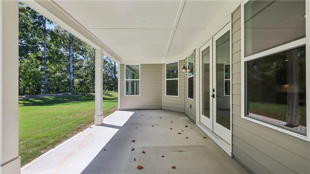 Exterior details and patio area of a home in Cresswind Georgia at Twin Lakes, Hoschton (Image 30).