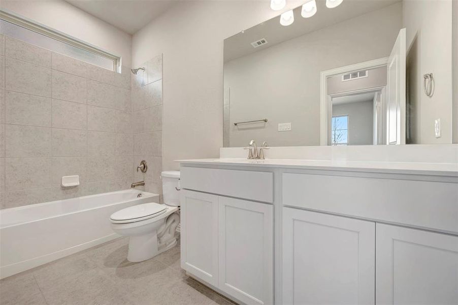 Furnished interior view inside a new home in Lily Creek at Sutton Fields, Aubrey (Image 8).