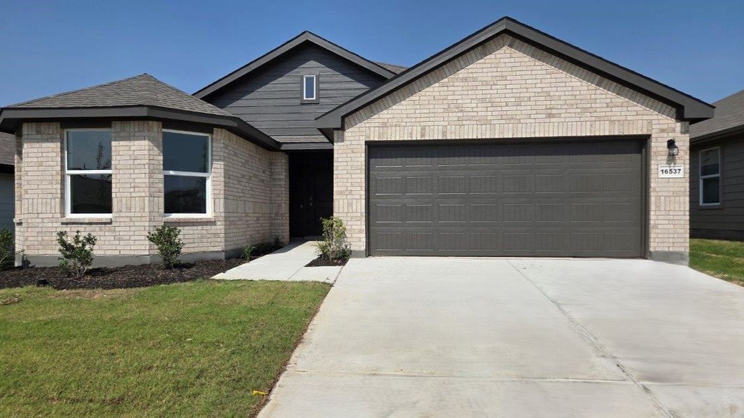 Front exterior of a new home in Lonestar at Liberty Trails, Fort Worth, TX, highlighting curb appeal (Image 1). Front exterior of a new home in Lonestar at Liberty Trails, Fort Worth, TX, highlighting curb appeal (Image 1).
