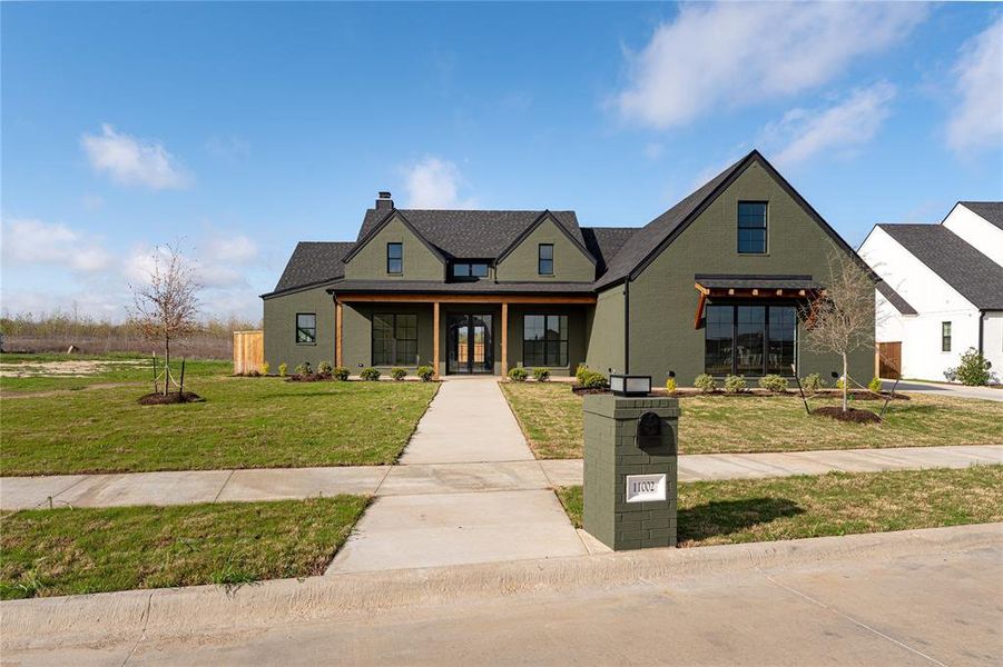 Front exterior of a new home in , Woodway, TX, highlighting curb appeal (Image 25).