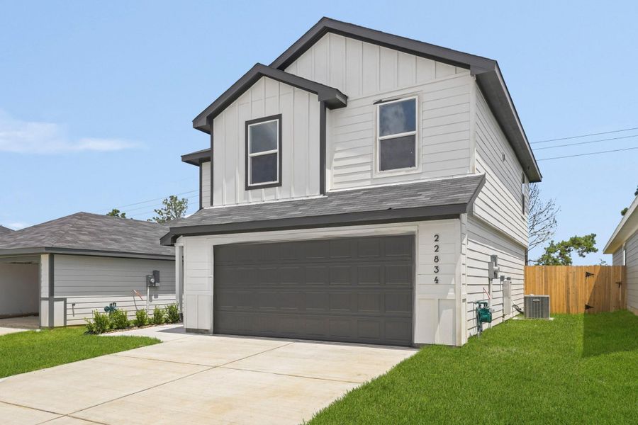 Front exterior of a new home in Sunset Valley, Hockley, TX, highlighting curb appeal (Image 2). Front exterior of a new home in Sunset Valley, Hockley, TX, highlighting curb appeal (Image 2).