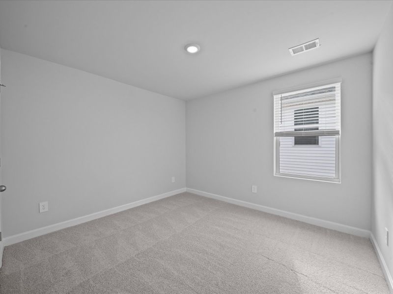 Spacious, unfurnished interior of a new home in Vickery Station, Woodruff (Image 18).