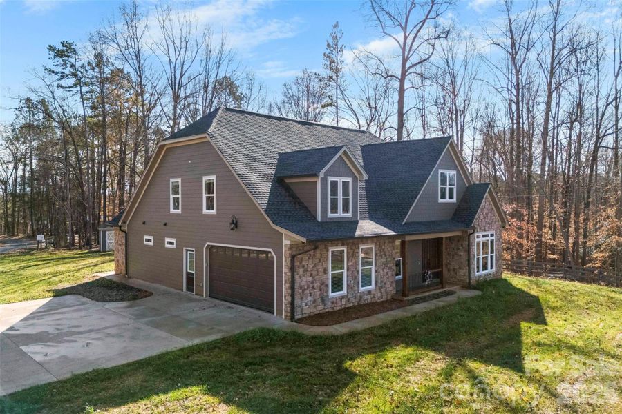 Front exterior of a new home in , Belmont, NC, highlighting curb appeal (Image 2). Front exterior of a new home in , Belmont, NC, highlighting curb appeal (Image 2).