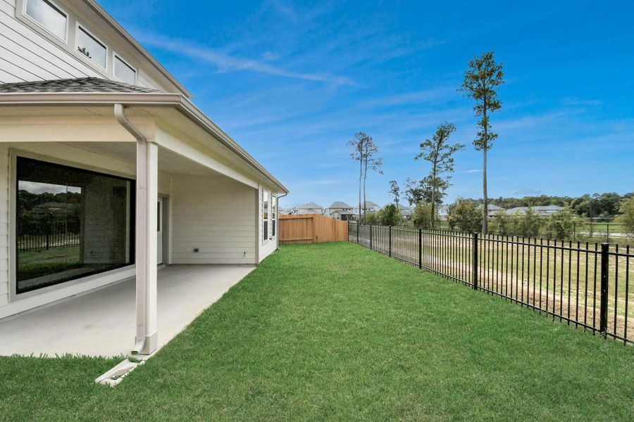 Backyard retreat, offering an abundance of space for kids to play and explore. The possibilities are endless in this outdoor haven, where the joy of open-air activities and family gatherings awaits. Backyard retreat, offering an abundance of space for kids to play and explore. The possibilities are endless in this outdoor haven, where the joy of open-air activities and family gatherings awaits.