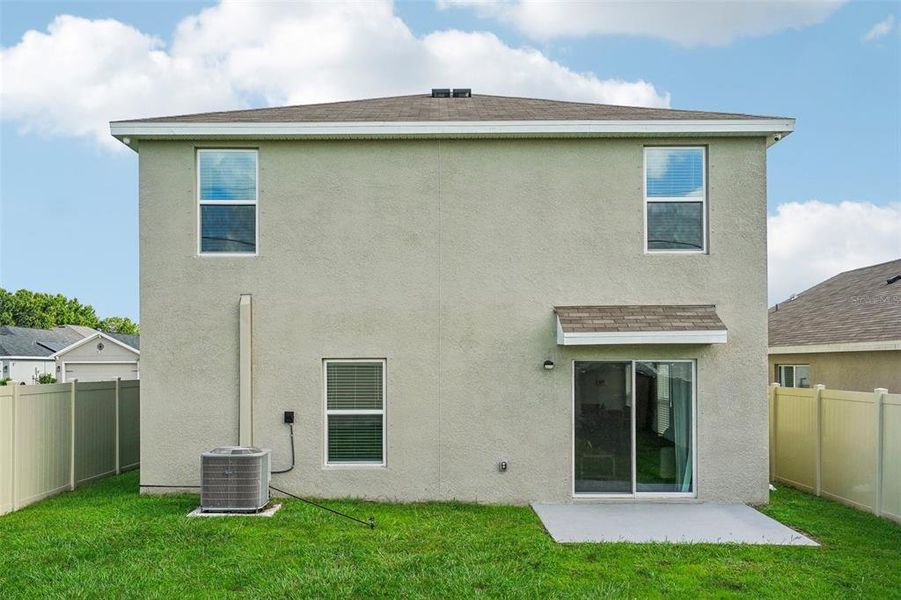 Exterior details and patio area of a home in Ridgewood, Riverview (Image 28).
