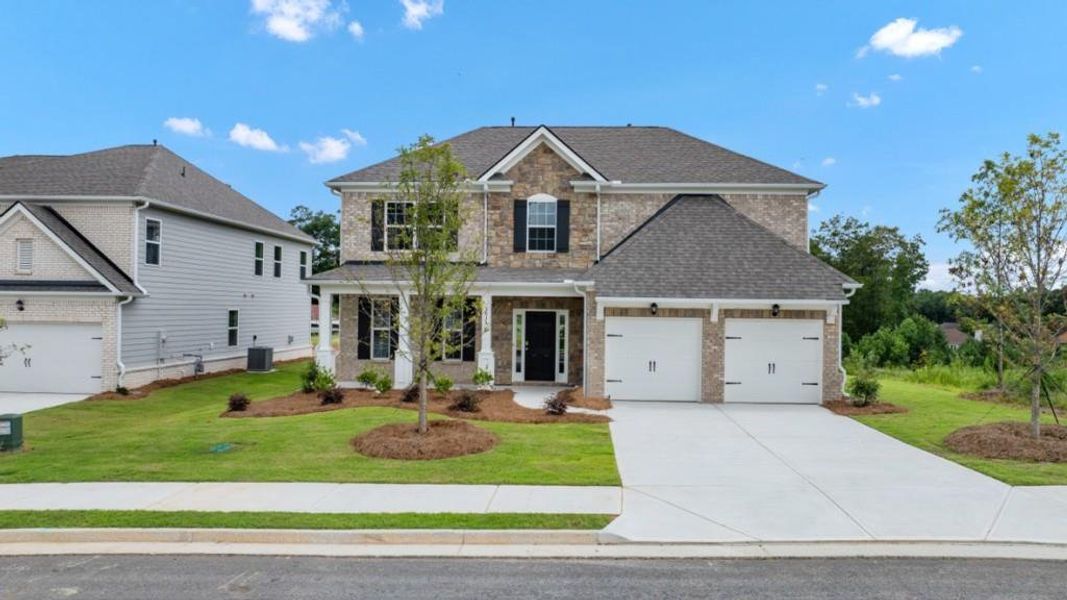 Front exterior of a new home in Butner Estates, South Fulton, GA, highlighting curb appeal (Image 20).