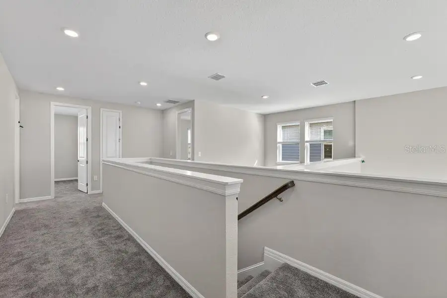 Spacious, unfurnished interior of a new home in Firethorn, Parrish (Image 28).