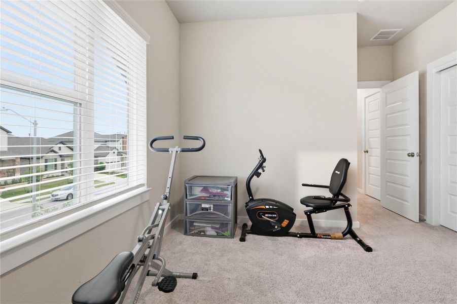 Furnished interior view inside a new home in University Heights, Round Rock (Image 34).