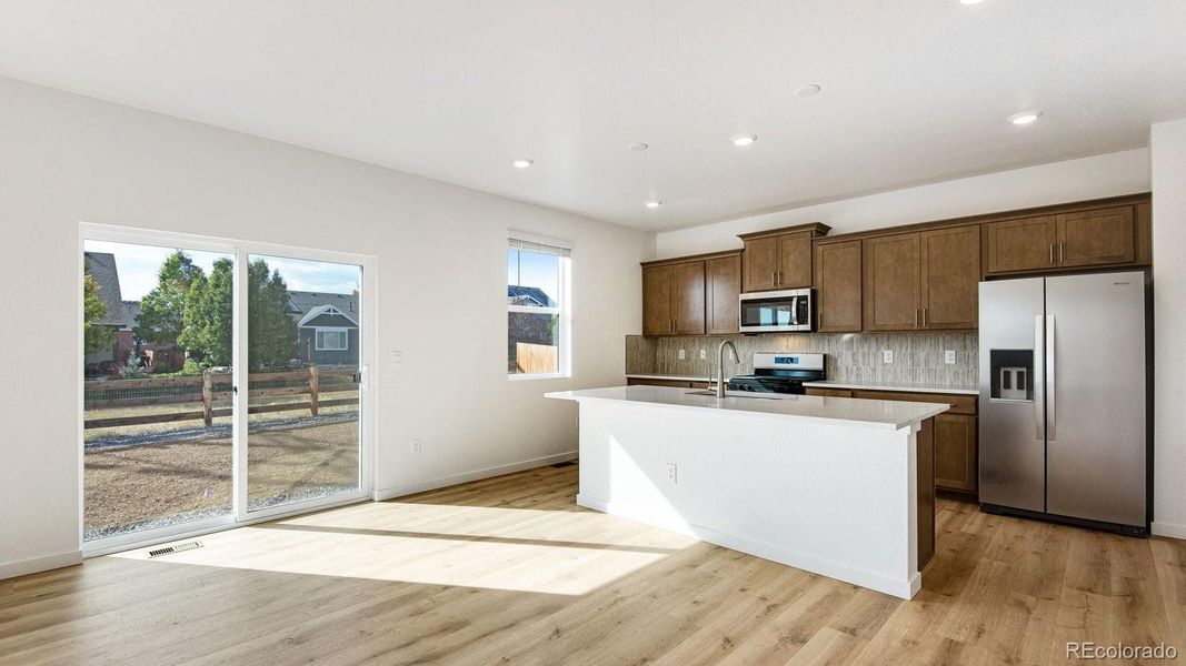 Furnished interior view inside a new home in Trails at Crowfoot, Parker (Image 4).