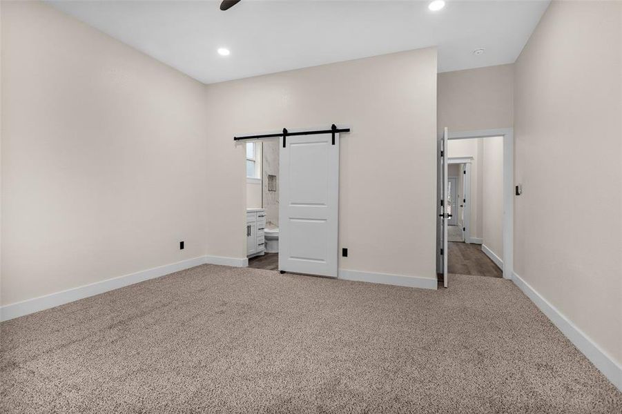 Entry into Bedroom #3 bathroom. Again notice the barn door that adds design.