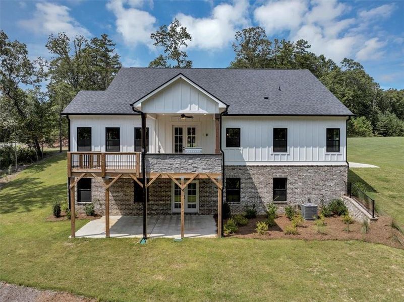 Front exterior of a new home in , Ball Ground, GA, highlighting curb appeal (Image 27).