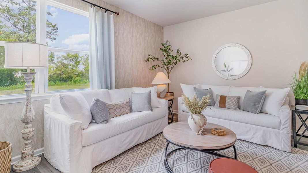 Representative furnished interior of a home built from the KENNER by D.R. Horton in Village Park, Oakland (Image 10).
