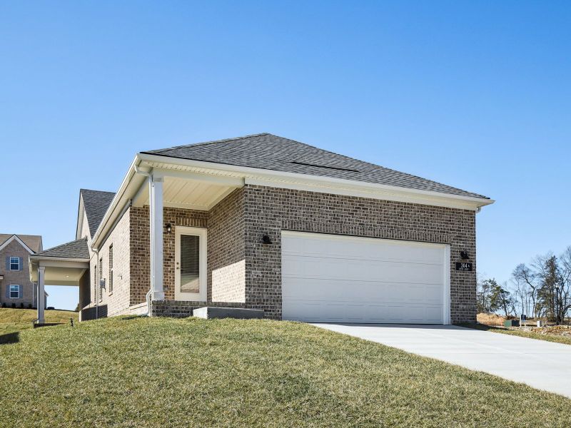 Front exterior of a new home in Benders Cove - Premier Series, Mount Juliet, TN, highlighting curb appeal (Image 2). Front exterior of a new home in Benders Cove - Premier Series, Mount Juliet, TN, highlighting curb appeal (Image 2).