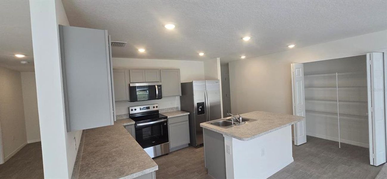Furnished interior view inside a new home in , Poinciana (Image 8). Furnished interior view inside a new home in , Poinciana (Image 8).