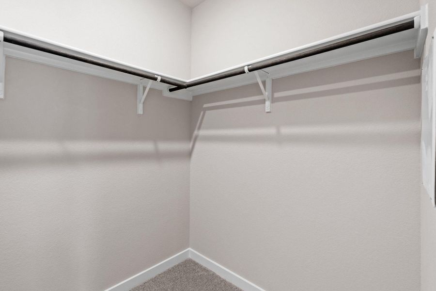 Walk-in closet in Primary Bedroom
