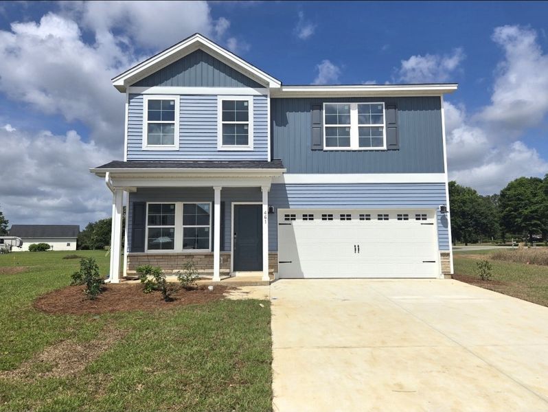 Front exterior of a new home in Garden Grove, Conway, SC, highlighting curb appeal (Image 1). Front exterior of a new home in Garden Grove, Conway, SC, highlighting curb appeal (Image 1).