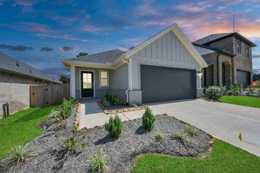 Front exterior of a new home in Montgomery Ridge: Landmark Collection, Montgomery, TX, highlighting curb appeal (Image 28). Front exterior of a new home in Montgomery Ridge: Landmark Collection, Montgomery, TX, highlighting curb appeal (Image 28).