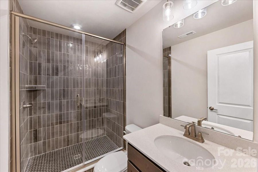 First Floor Full Bathroom with Tiled Sower