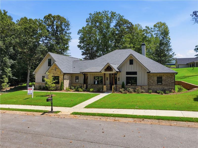 Front exterior of a new home in , Commerce, GA, highlighting curb appeal (Image 2). Front exterior of a new home in , Commerce, GA, highlighting curb appeal (Image 2).