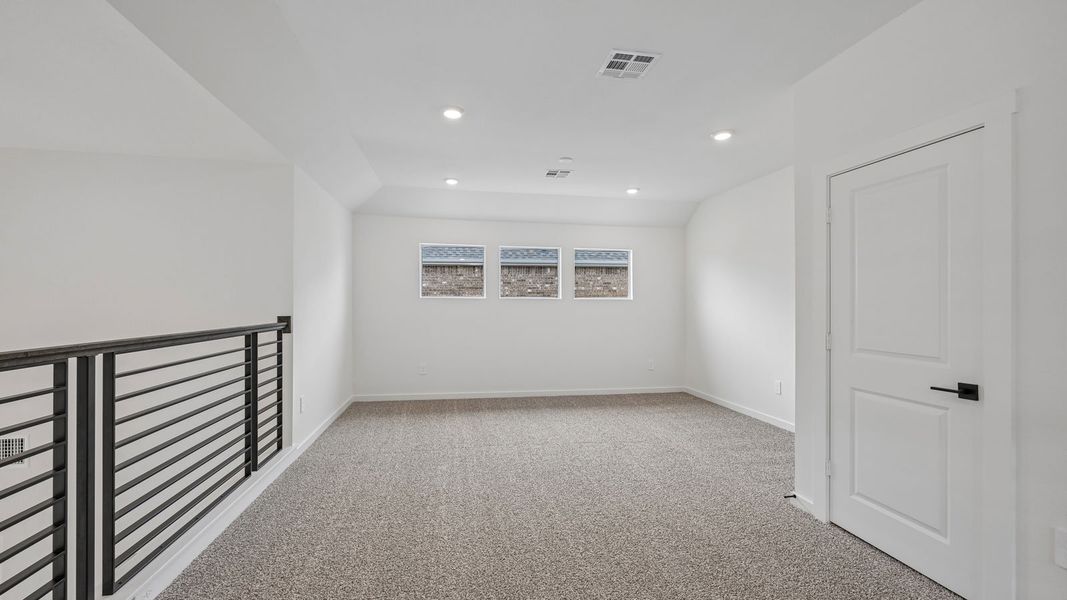 Spacious, unfurnished interior of a new home in The Enclave at Bar W Ranch, Leander (Image 28).