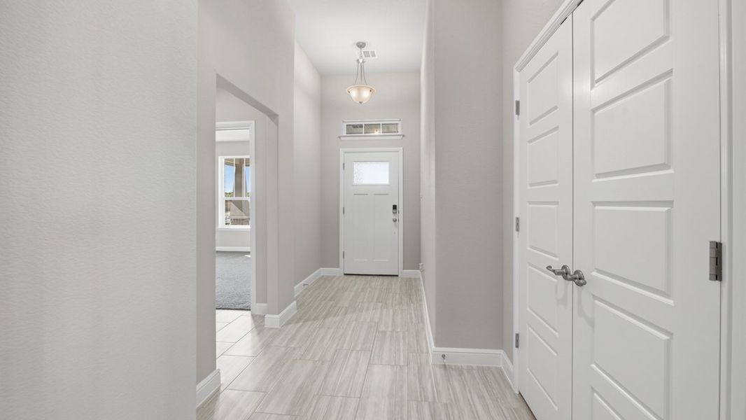 Representative unfurnished interior of a home built from the BASSWOOD by D.R. Horton in Treeline, Justin (Image 38).