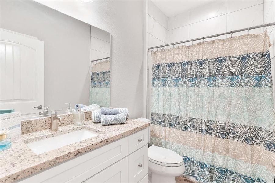 Guest Bathroom with Tub and Shower Combo