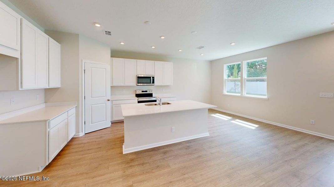 Furnished interior view inside a new home in Sandridge Hills, Green Cove Springs (Image 4).